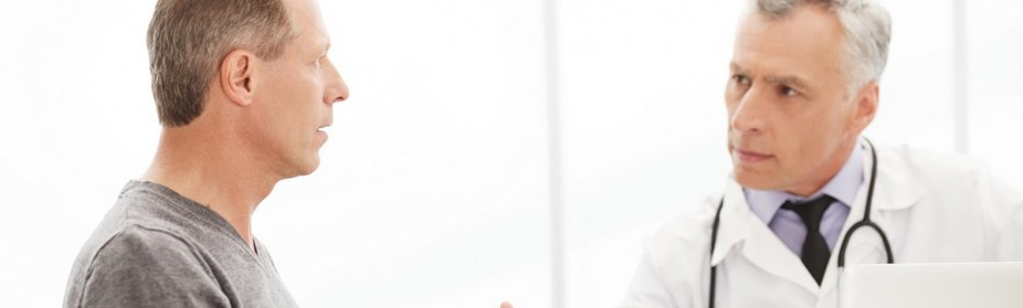 A man with prostatitis in the reception of a urologist